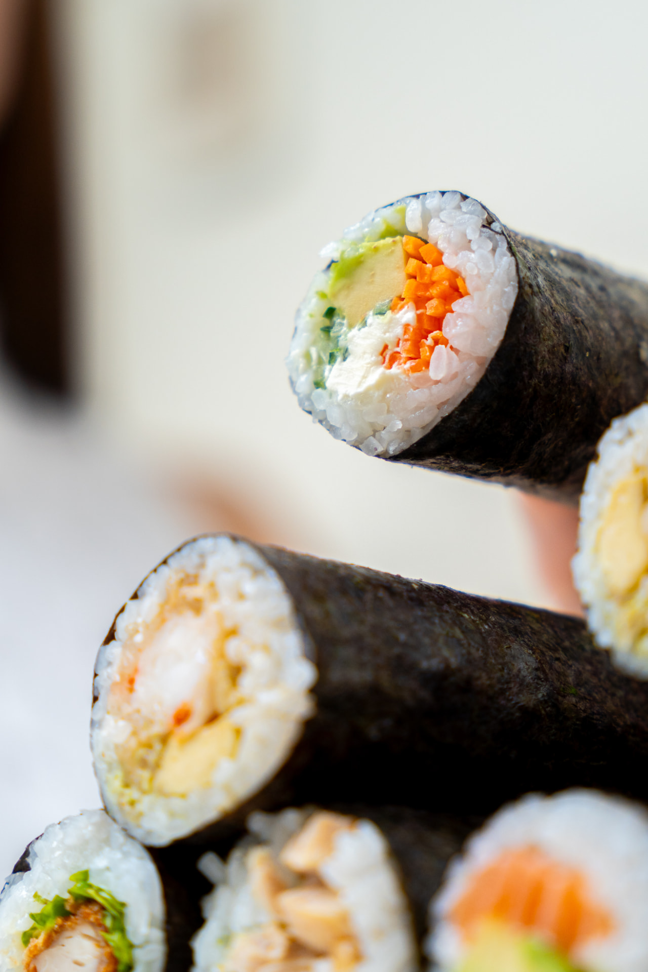 Close up of fresh MAKU rolls showing the fillings
